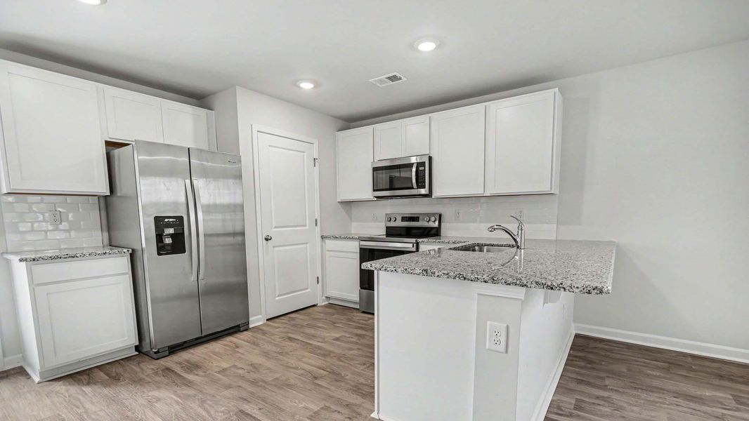 Furnished interior view inside a new home in The Park at Wilkinson, Orangeburg (Image 4).
