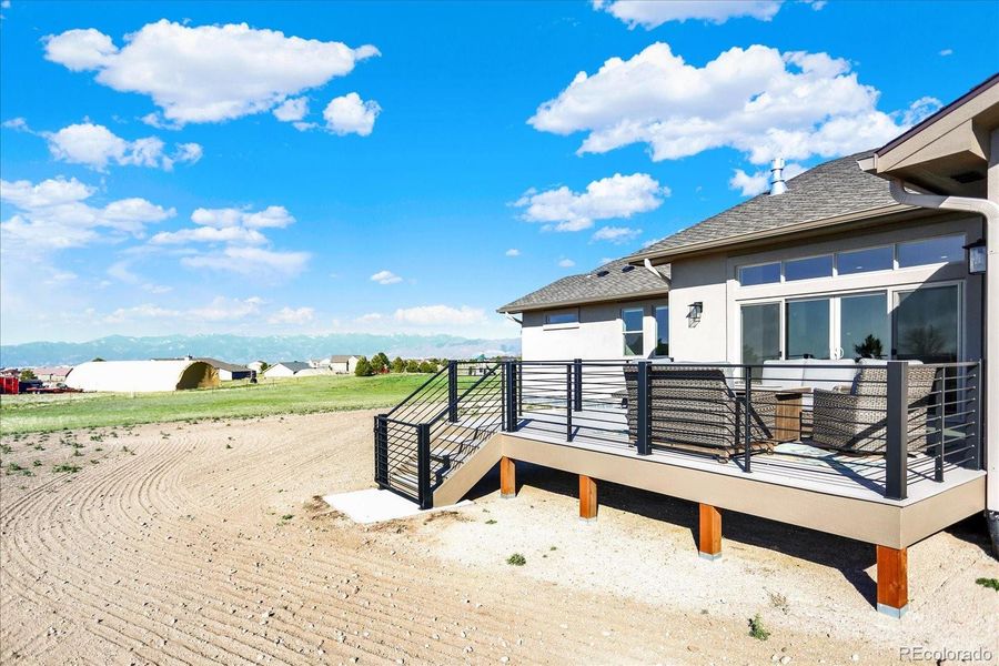 Front exterior of a new home in , Colorado Springs, CO, highlighting curb appeal (Image 22).