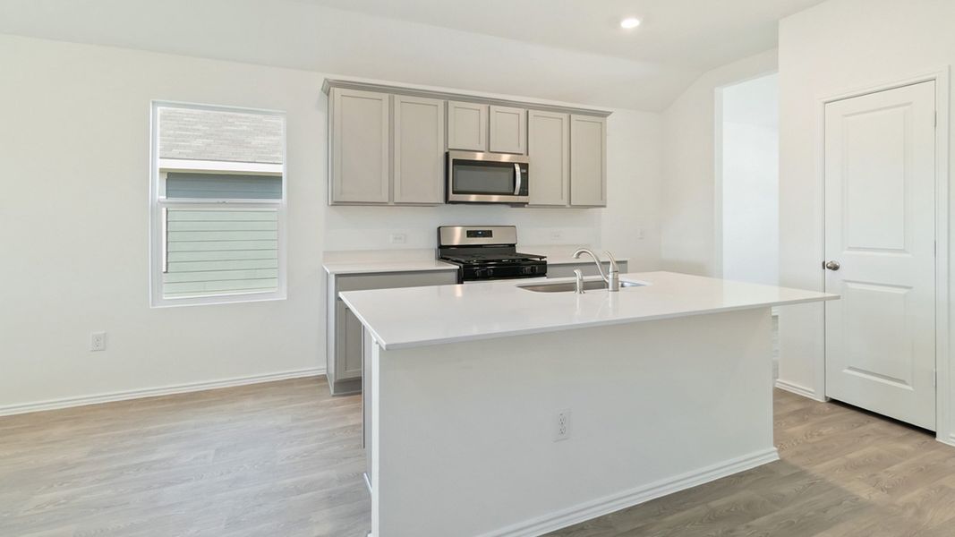 Representative furnished interior of a home built from the The Abbot by D.R. Horton in Talavera, Kyle (Image 3).