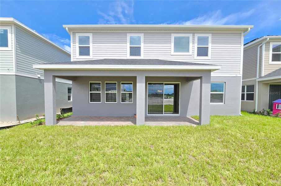 Exterior details and patio area of a home in Bay Lake Farms, St. Cloud (Image 35).