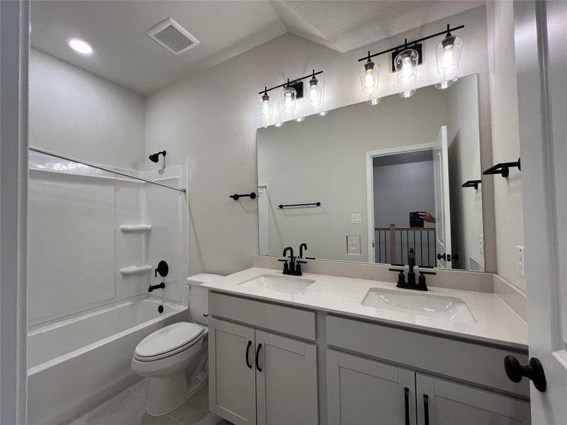 Furnished interior view inside a new home in Rolling Glen, Hutto (Image 11).