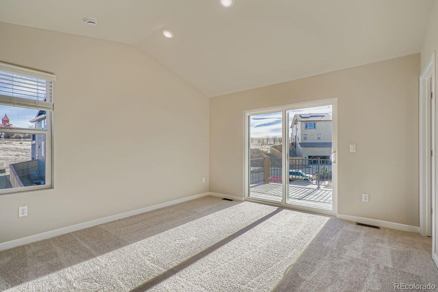 primary bedroom with private deck