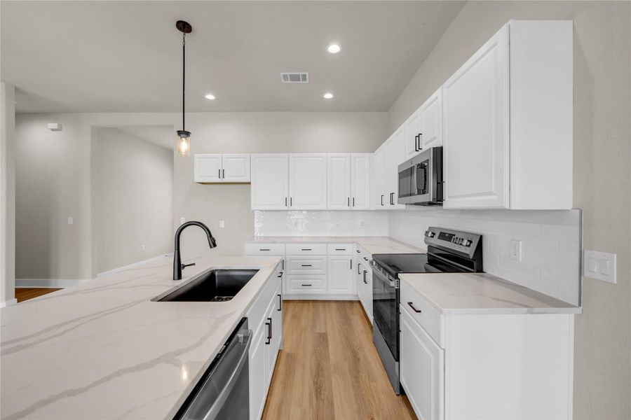 Furnished interior view inside a new home in , Bertram (Image 9).