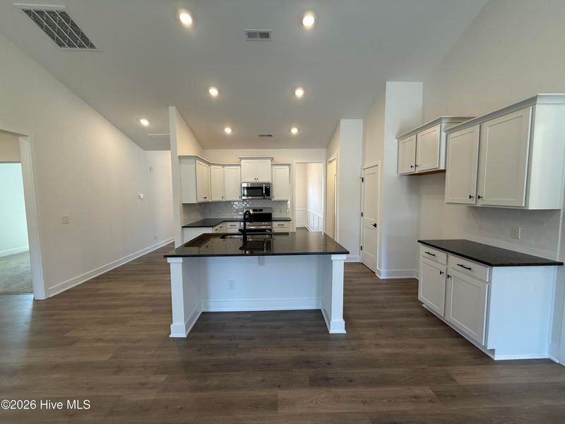 Furnished interior view inside a new home in Wood Creek Landing, Leland (Image 7).