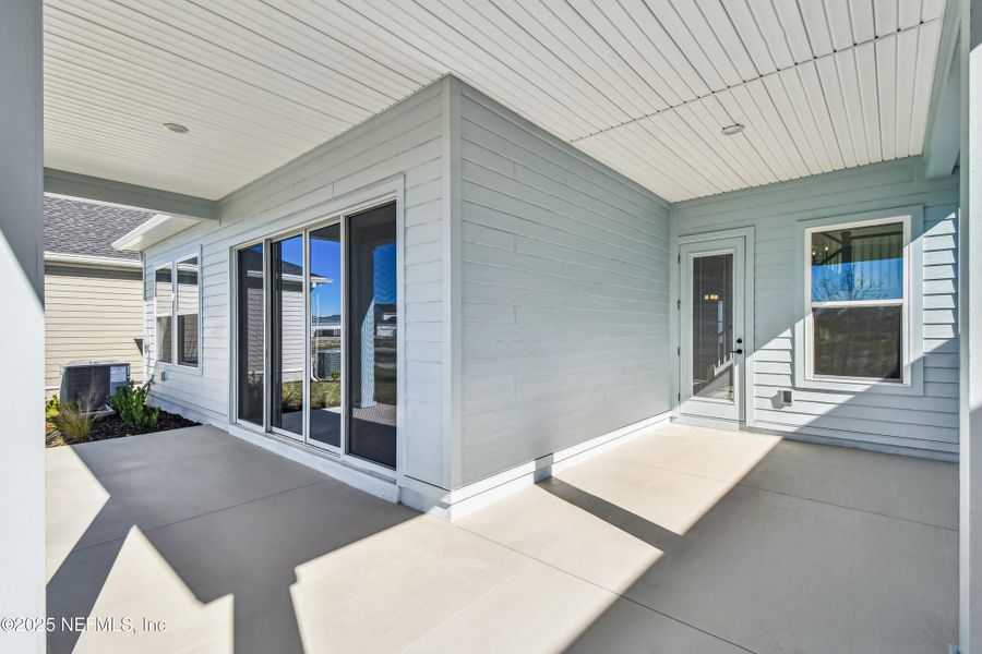 Exterior details and patio area of a home in Seven Pines 50' Front Entry, Jacksonville (Image 3).