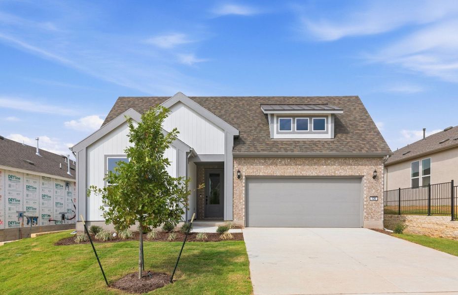 Front exterior of a new home in Sun City Texas, Georgetown, TX, highlighting curb appeal (Image 22). Front exterior of a new home in Sun City Texas, Georgetown, TX, highlighting curb appeal (Image 22).