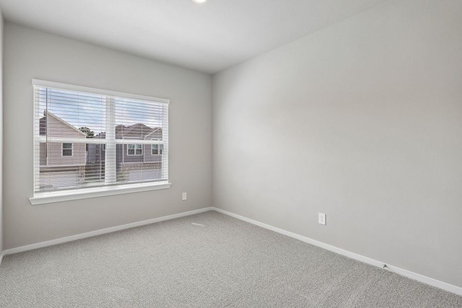 Spacious, unfurnished interior of a new home in Pinewood Trails - City Series, Atascocita (Image 29).