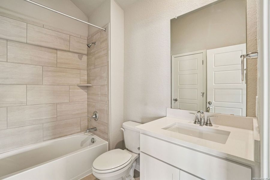 Furnished interior view inside a new home in Estancia Ranch - Classic Series, San Antonio (Image 13).