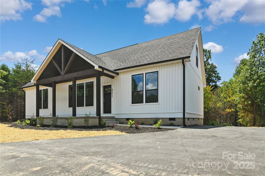 Front exterior of a new home in , Morganton, NC, highlighting curb appeal (Image 19).