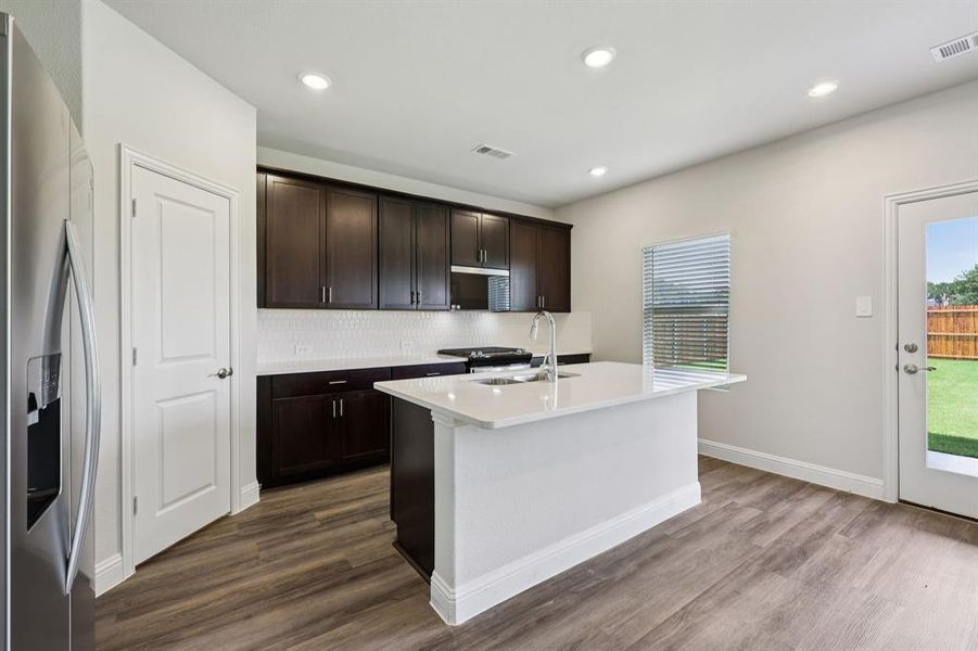 Furnished interior view inside a new home in Westmoor, Sherman (Image 6).