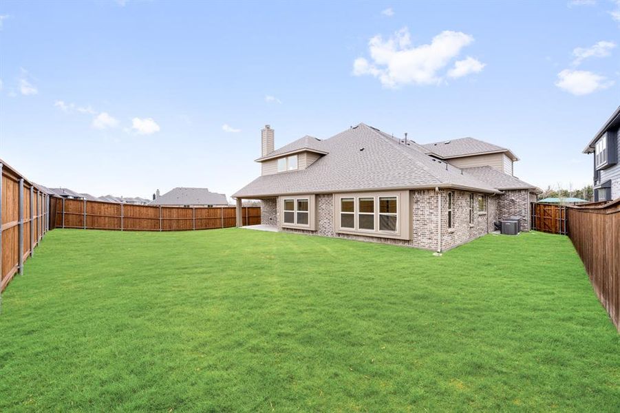 Exterior details and patio area of a home in Terracina, Rockwall (Image 23).