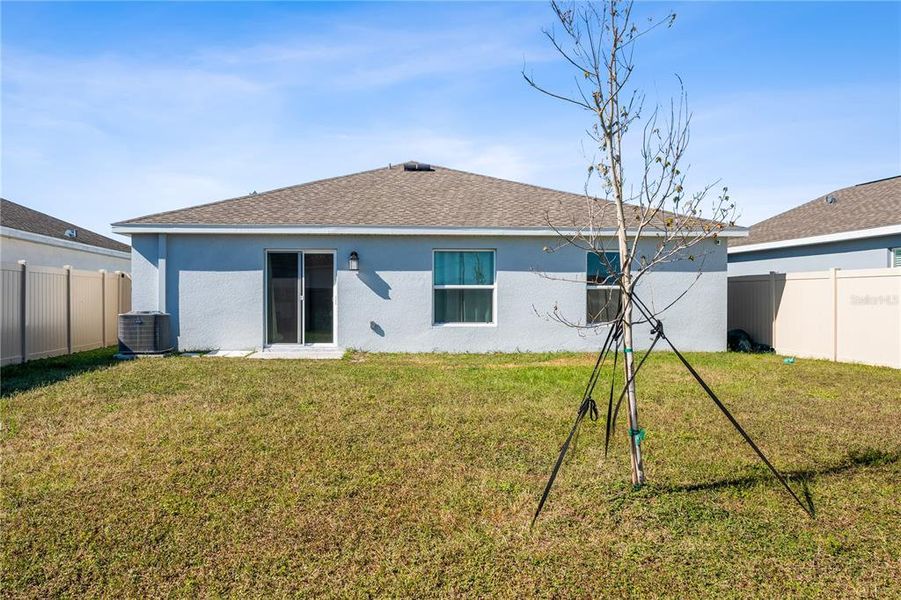 Exterior details and patio area of a home in Peace Creek Reserve: Grand Collection, Winter Haven (Image 2).