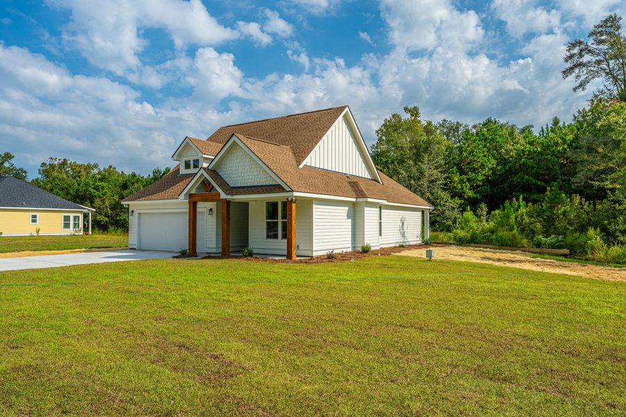 Front exterior of a new home in , McClellanville, SC, highlighting curb appeal (Image 25).