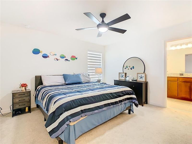 Furnished interior view inside a new home in Horse Creek at Crosswinds, Davenport (Image 15).