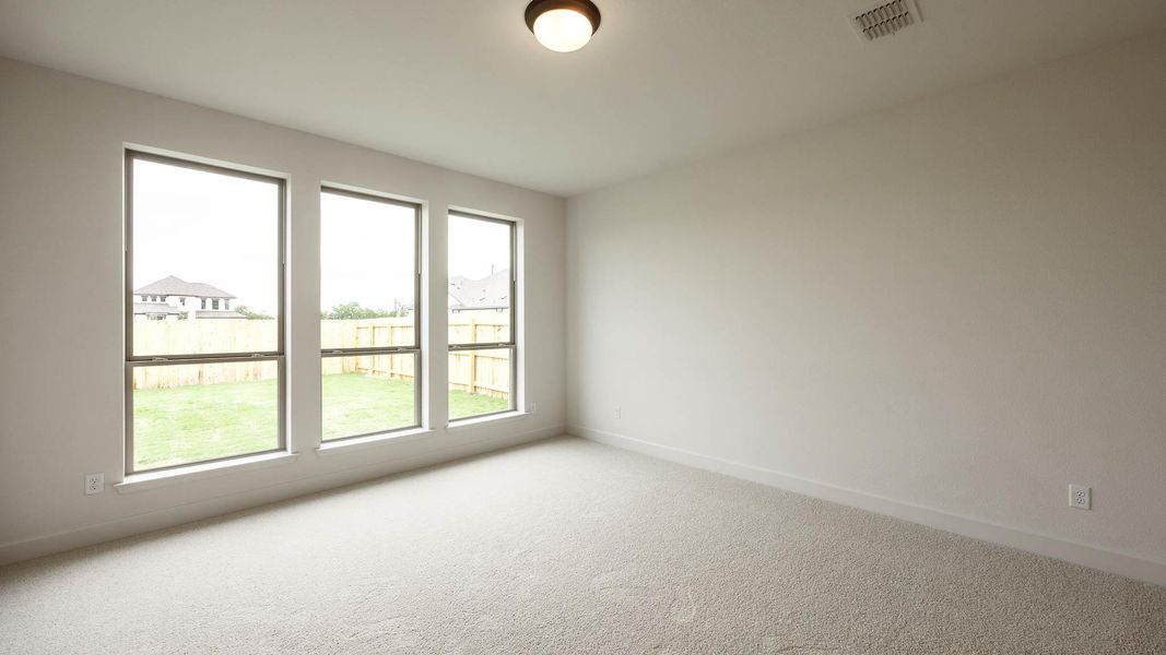 Spacious, unfurnished interior of a new home in Santa Rita Ranch - Tierra Rosa, Liberty Hill (Image 11).