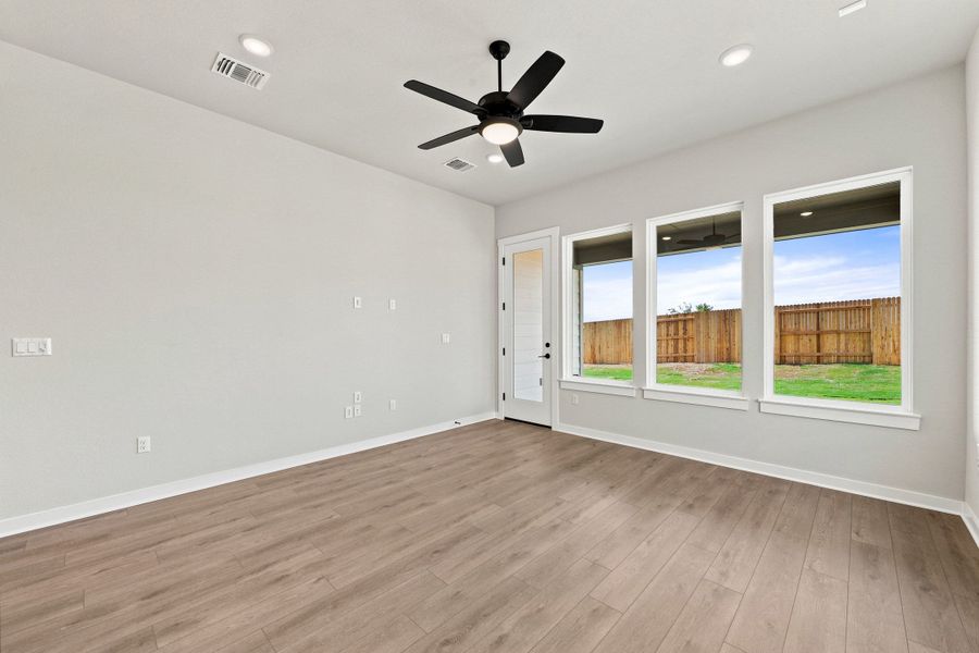 Spacious, unfurnished interior of a new home in Terrace Collection At Turner's Crossing, Buda (Image 25).