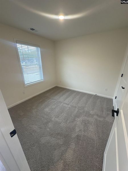 Spacious, unfurnished interior of a new home in Piney Woods Bluff, Columbia (Image 9).