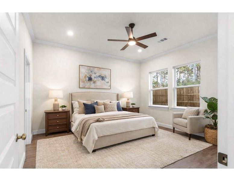 Staged image of the primary bedroom Staged image of the primary bedroom