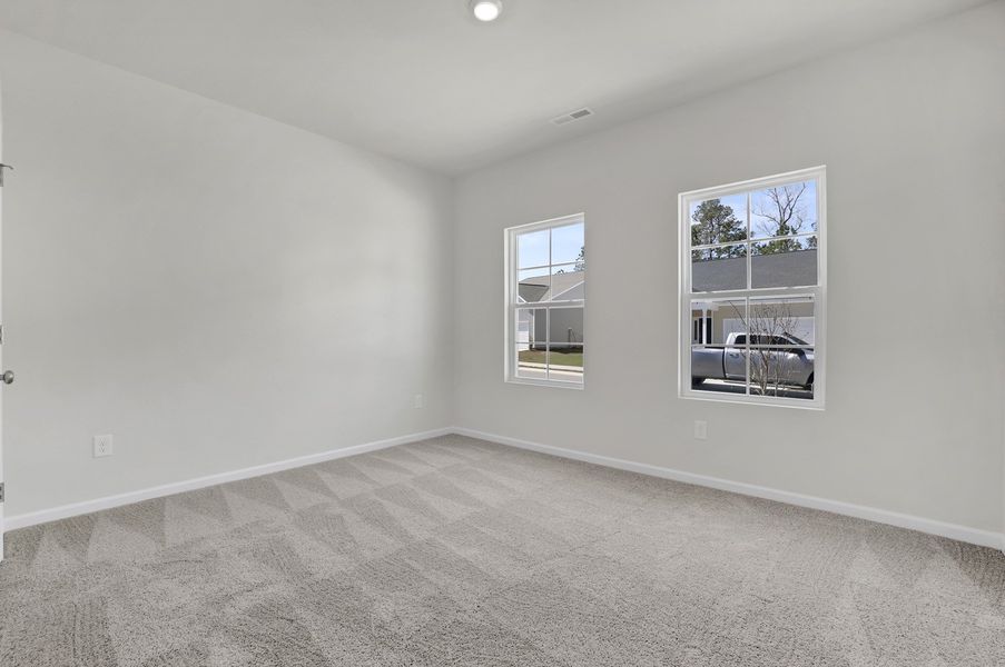 Spacious, unfurnished interior of a new home in River Tide Farms, Bolivia (Image 20).