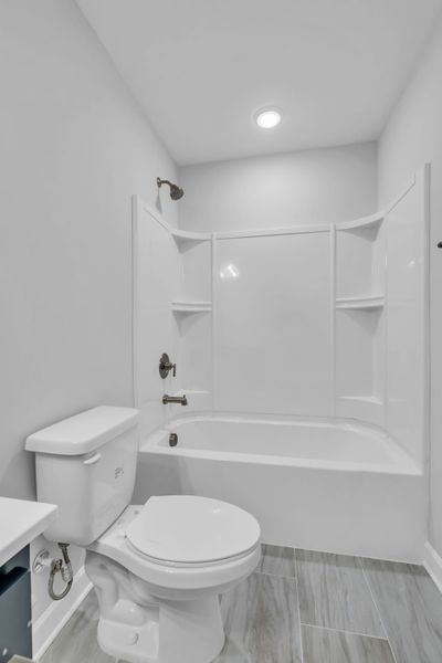 Bright and Modern Shared Bathroom in The Harrington