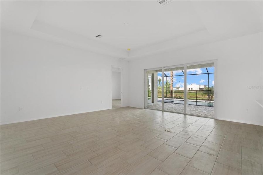 Spacious, unfurnished interior of a new home in Calusa Country Club, Lakewood Ranch (Image 24).
