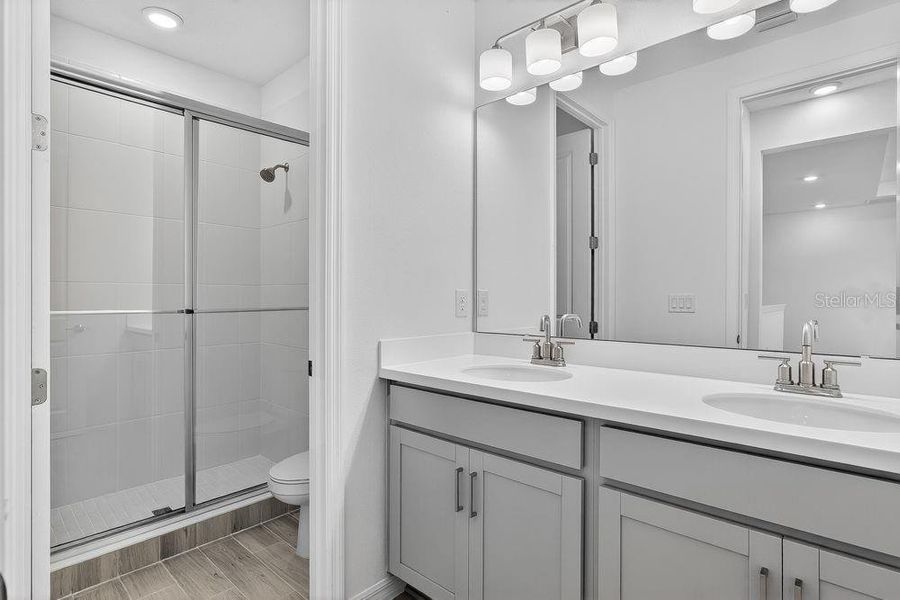 Furnished interior view inside a new home in Ardisia Park, New Smyrna Beach (Image 16).
