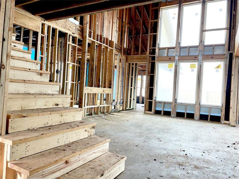 Open Railing Staircase Overlooking the Family