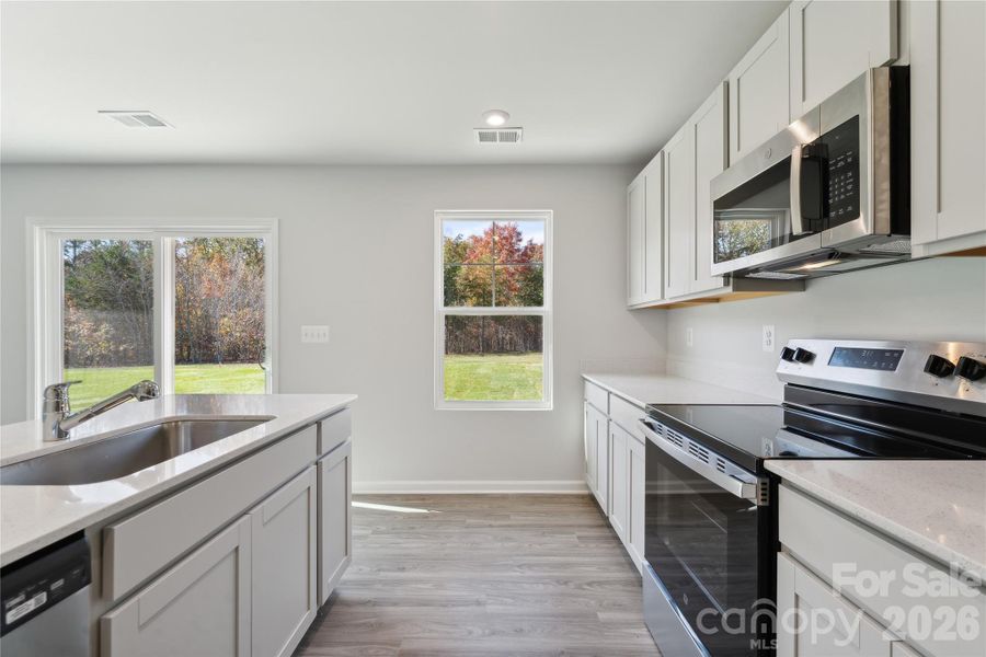 Example Photo Example Photo