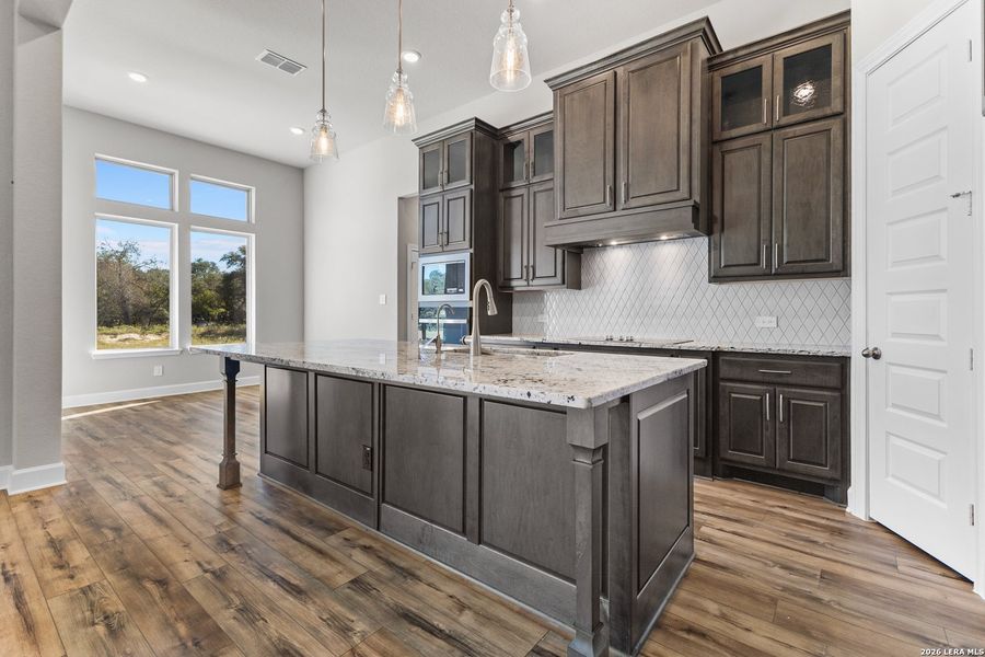 Furnished interior view inside a new home in Pradera Ridge, Floresville (Image 5).