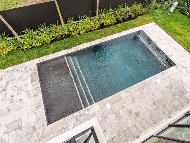 Exterior details and patio area of a home in , Miami (Image 22). Exterior details and patio area of a home in , Miami (Image 22).