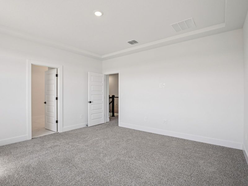 Spacious, unfurnished interior of a new home in Magnolia Bay - Reserve Series, Nokomis (Image 15).