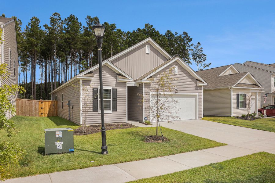 Front exterior of a new home in , Summerville, SC, highlighting curb appeal (Image 22).