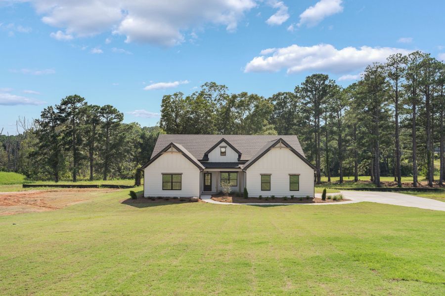 Front exterior of a new home in The Reserve at Reidsboro, Williamson, GA, highlighting curb appeal (Image 29).