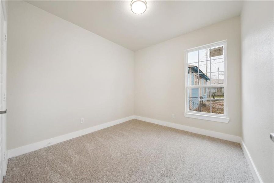 Empty room featuring carpet floors