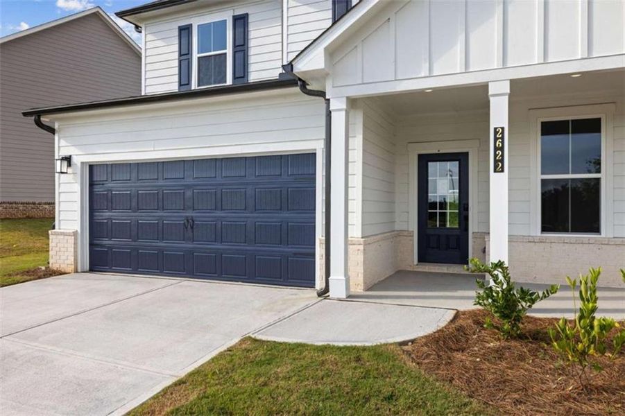 Exterior details and patio area of a home in The Estates at Gainesville Township, Gainesville (Image 4).