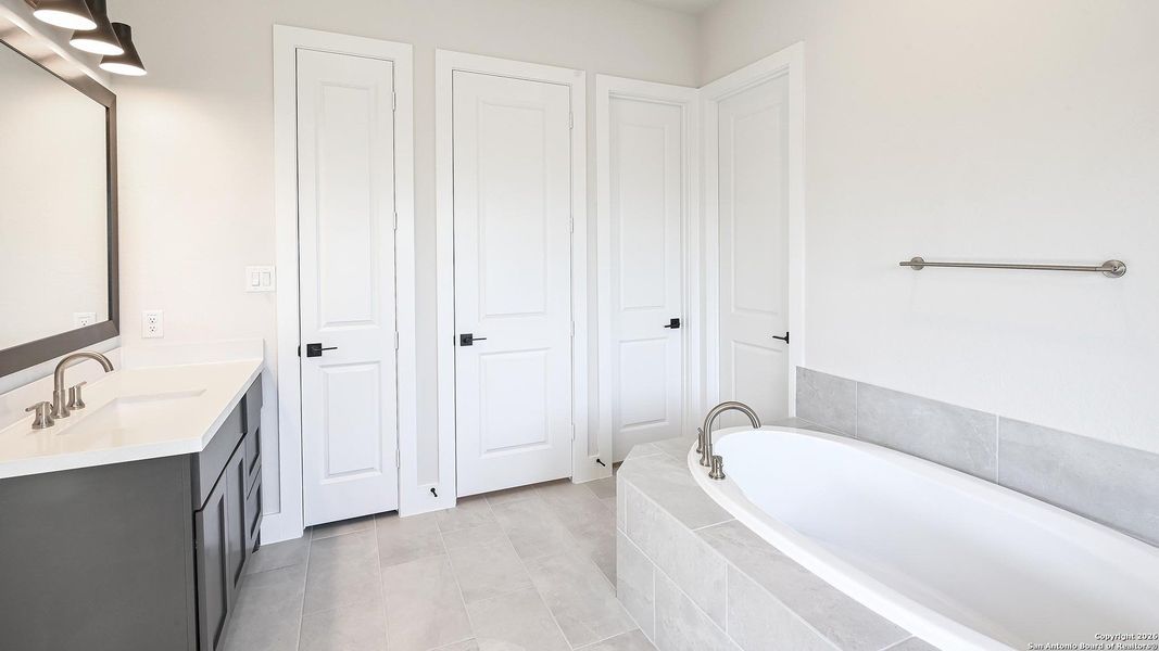 Furnished interior view inside a new home in Cibolo Valley Heights 65', Cibolo (Image 11).