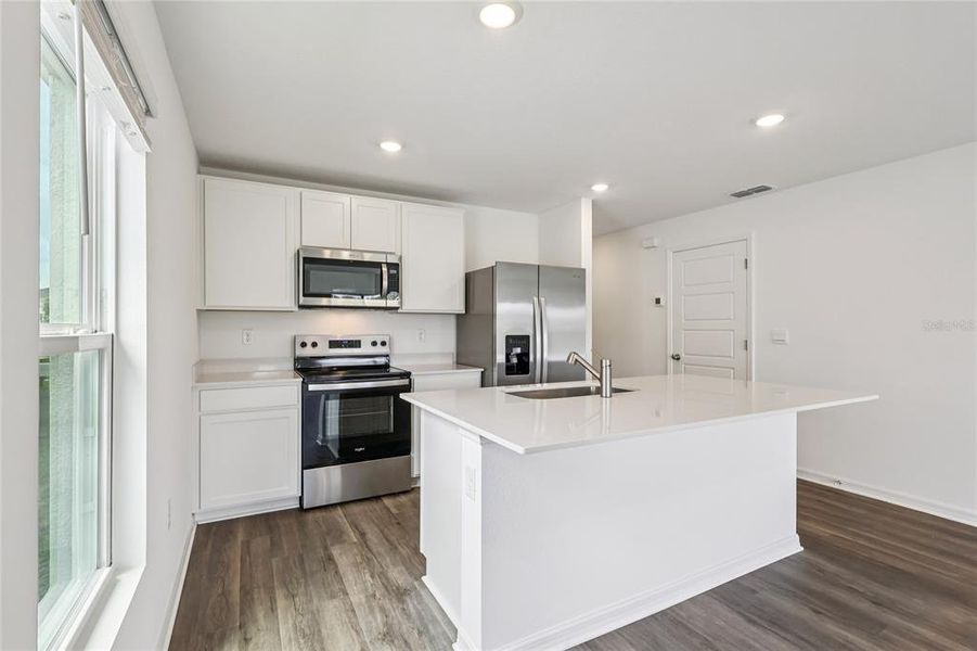 Furnished interior view inside a new home in Leoma's Landing, Lake Wales (Image 9).