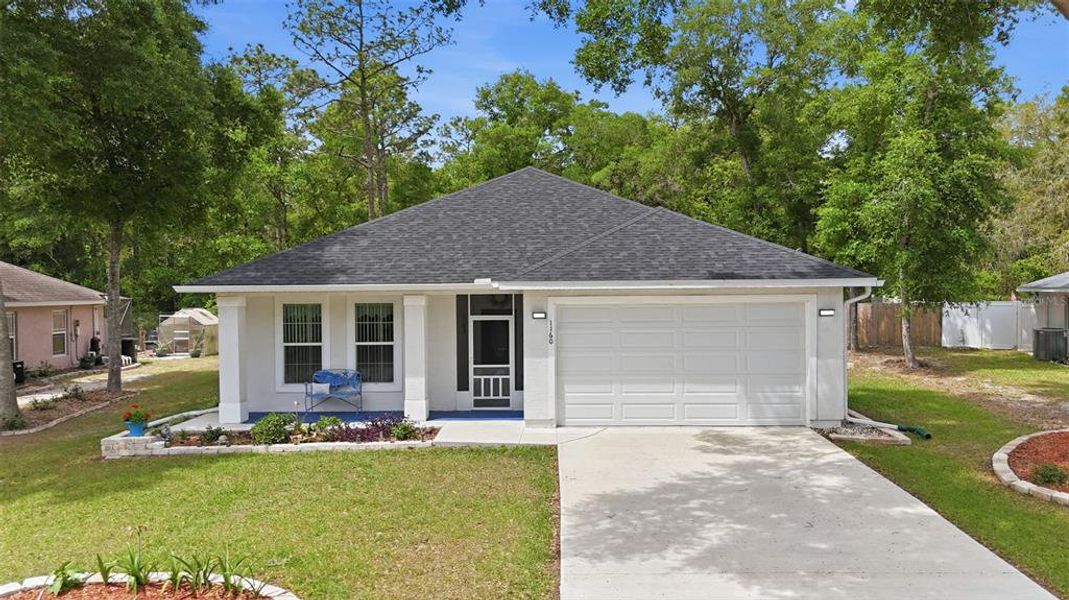 Front exterior of a new home in , Silver Springs, FL, highlighting curb appeal (Image 25).