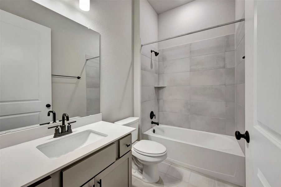 Furnished interior view inside a new home in Heritage, Dripping Springs (Image 15).