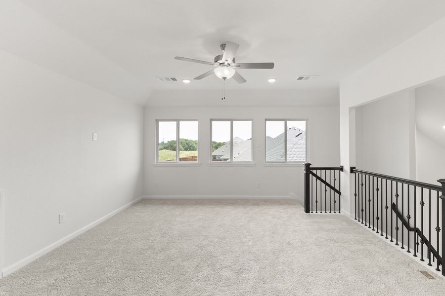 Spacious, unfurnished interior of a new home in The Reserve at Spiritas Ranch, Little Elm (Image 29).