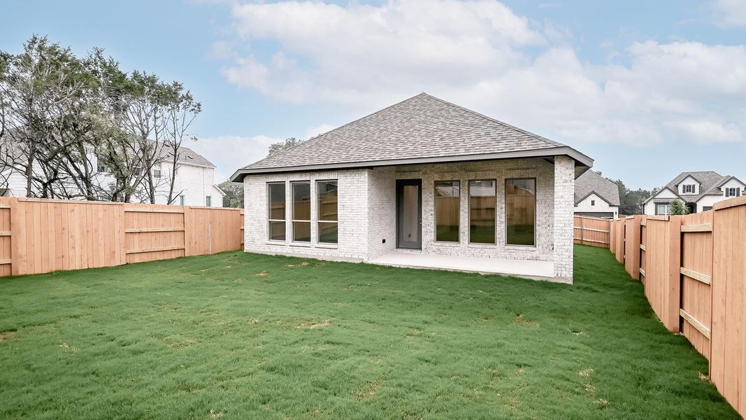 Exterior details and patio area of a home in 6 Creeks, Kyle (Image 4).