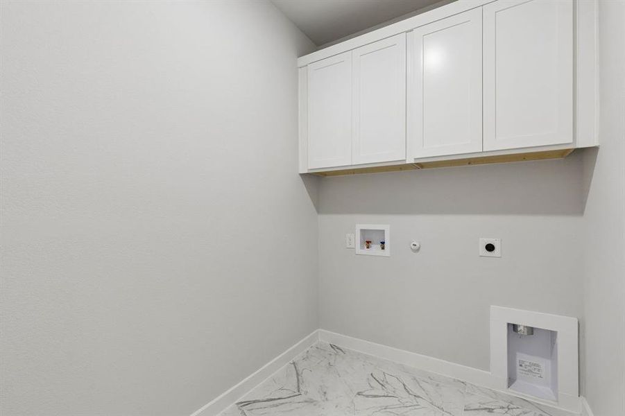 Utility Room in the Winters home plan by Trophy Signature Homes – REPRESENTATIVE PHOTO Utility Room in the Winters home plan by Trophy Signature Homes – REPRESENTATIVE PHOTO