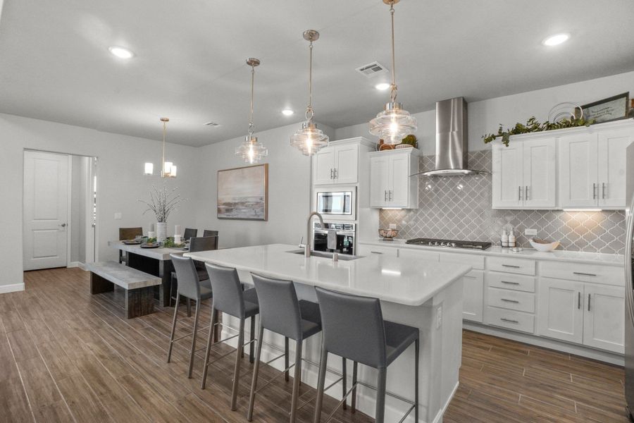 Representative furnished interior of a home built from the Capitan by Hakes Brothers in Hillside Park, El Paso (Image 14).