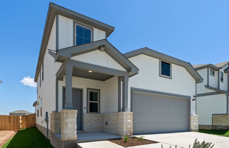 Front exterior of a new home in Sonterra, Jarrell, TX, highlighting curb appeal (Image 21). Front exterior of a new home in Sonterra, Jarrell, TX, highlighting curb appeal (Image 21).