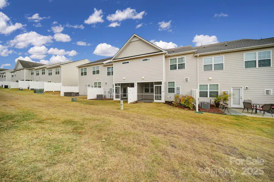 Exterior details and patio area of a home in Windhaven: Glen, Tega Cay (Image 3).
