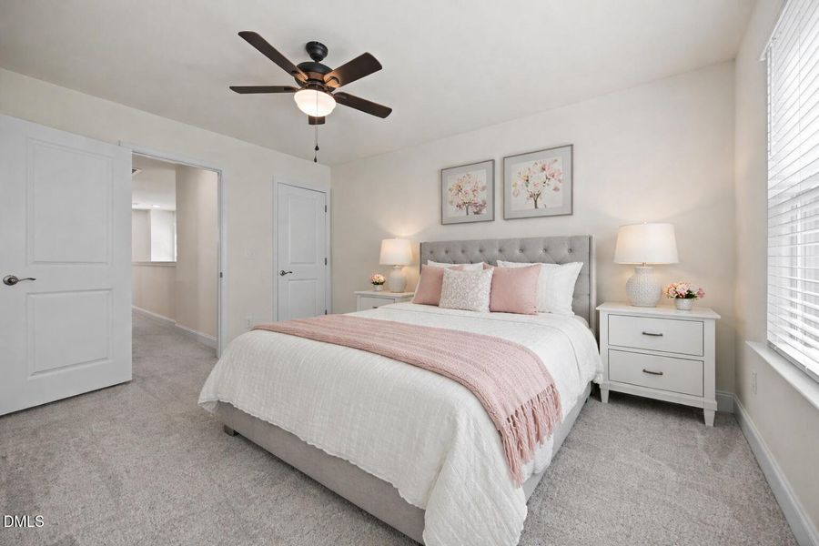 Inviting guest bedroom with pink accents
