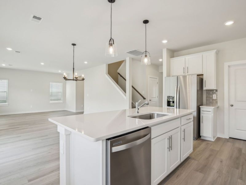 Kitchen in the Dakota floorplan in a Meritage Homes community.