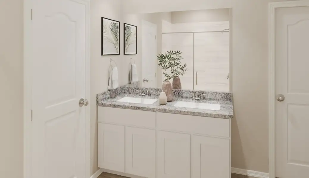 A bathroom with a marble countertop.