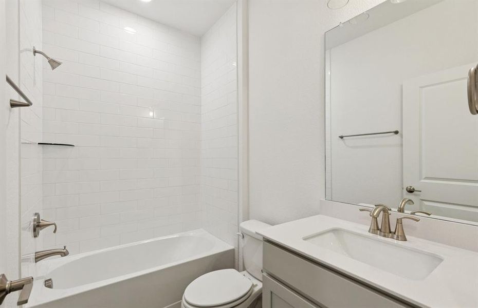 Upgraded secondary bath with elegant finishes *Real home pictured Upgraded secondary bath with elegant finishes *Real home pictured