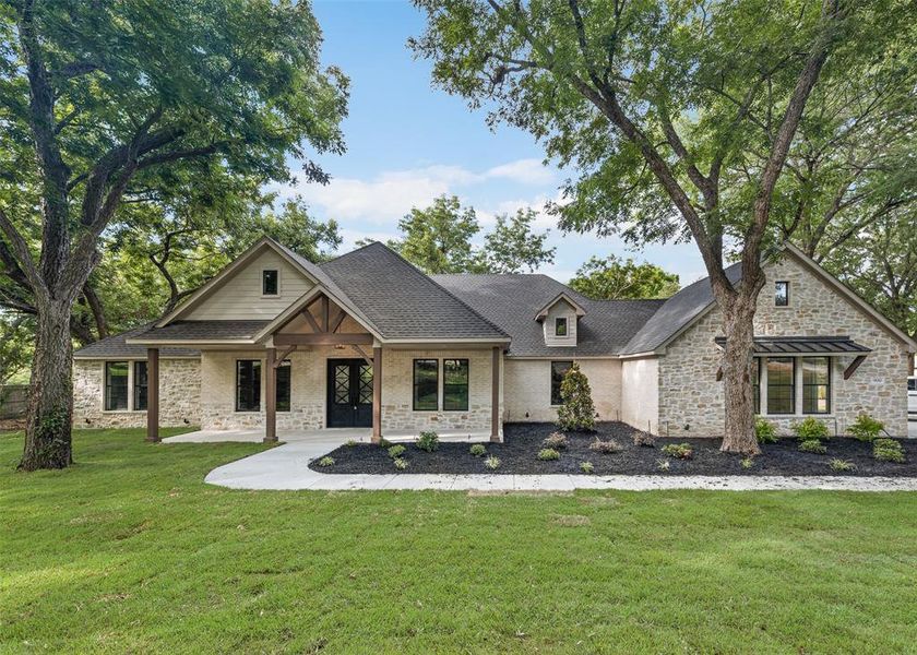 Front exterior of a new home in , Ovilla, TX, highlighting curb appeal (Image 1). Front exterior of a new home in , Ovilla, TX, highlighting curb appeal (Image 1).